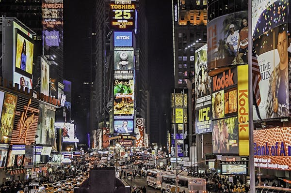 Explore the bustling nightlife of Times Square with dazzling lights and vibrant crowds.